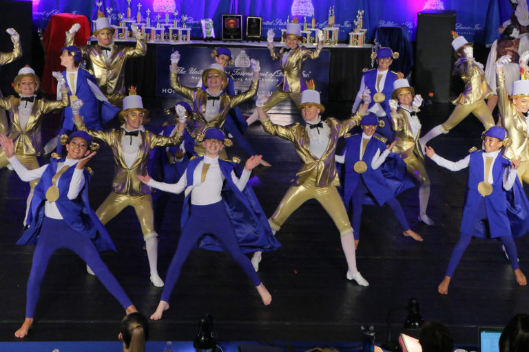 Costumed dancers performing routine